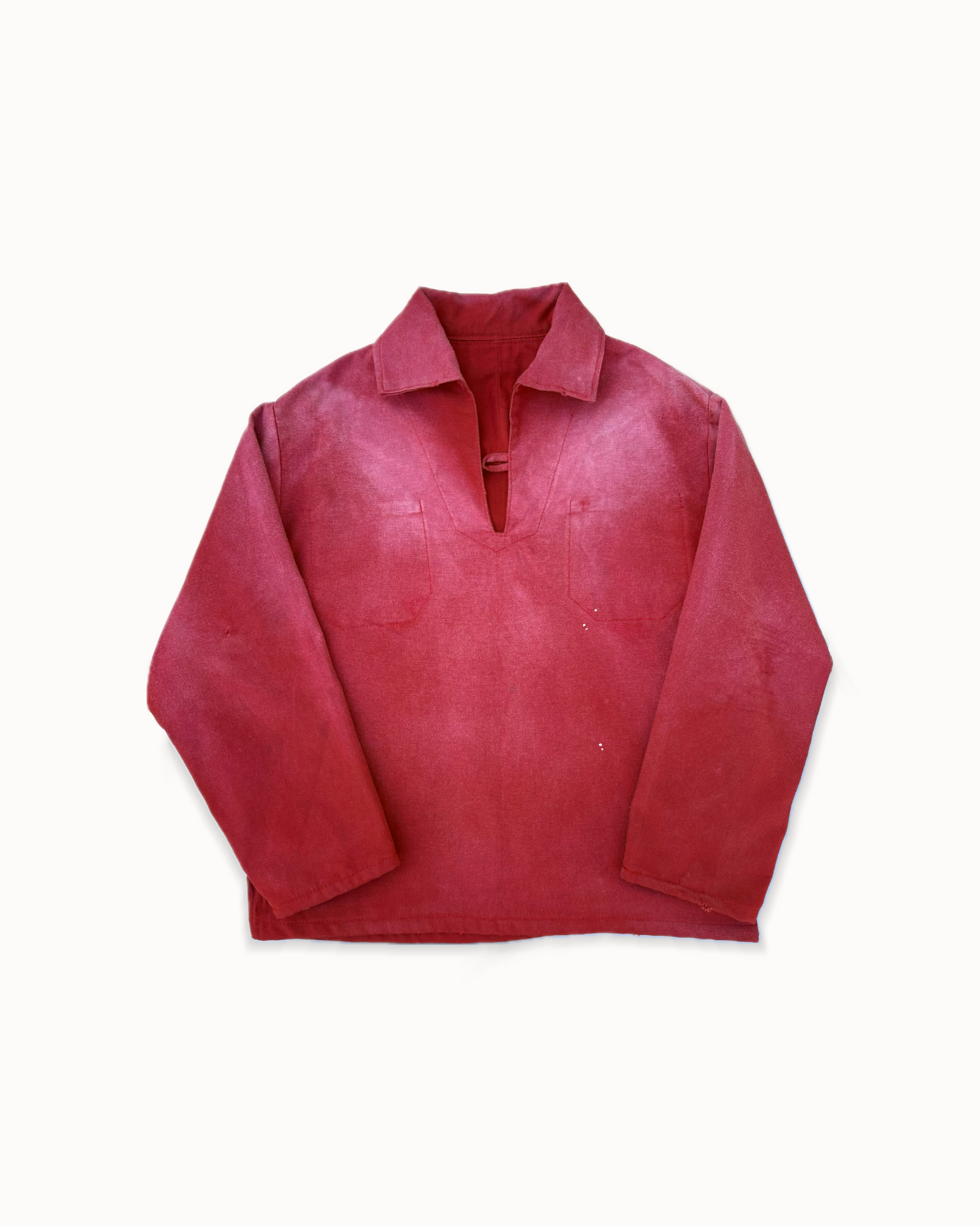 Burgundy cotton canvas vareuse, front view with open collar and two chest pockets