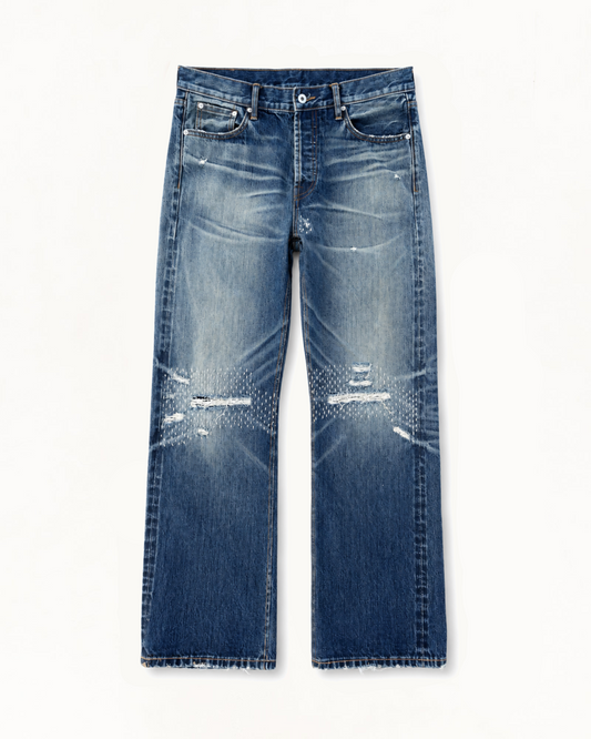 Washed selvedge denim with sashiko repair stitching across both knees